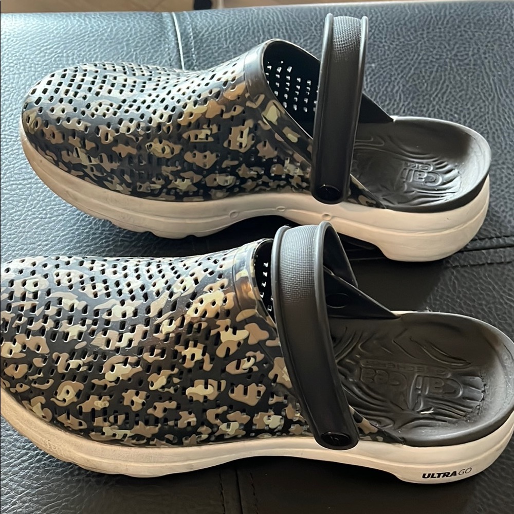 Skechers Black and Gray Mules with Intricate Pattern